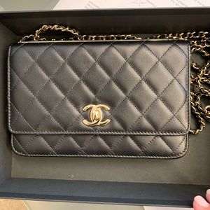 Chanel wallet on a chain.